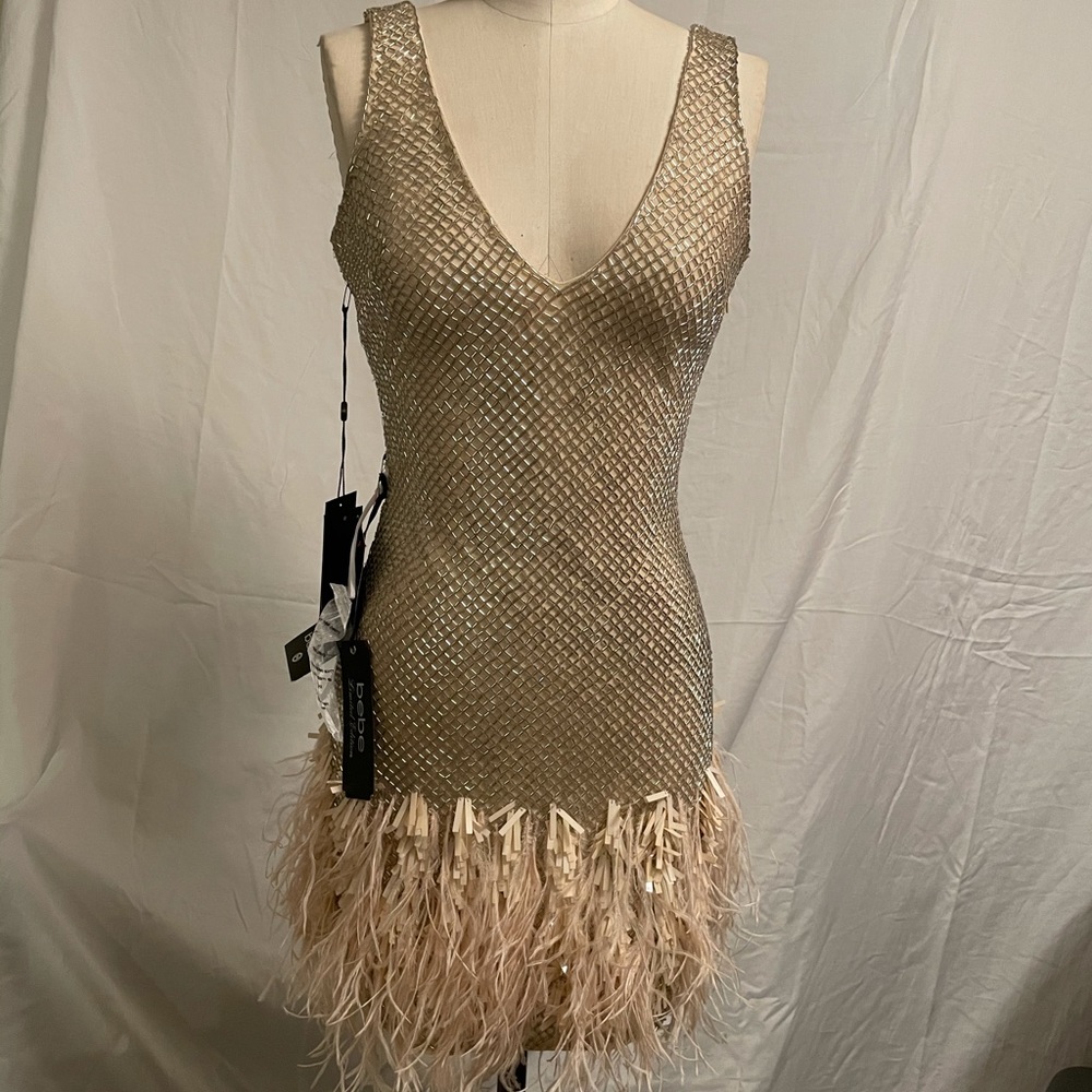 NEW bebe limited Edition ""Feather Trim Featured Sequence Dress"". SIZE XXS